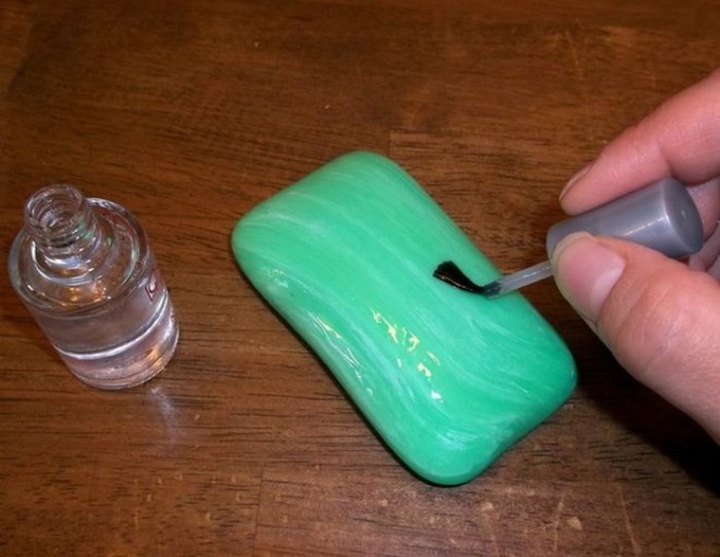 Coat your hand soap with clear nail polish! 
