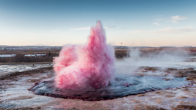 Eruption of pink geyser
