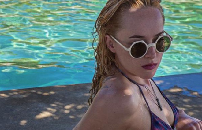 Dakota Johnson is definitely not shy in front of the camera.