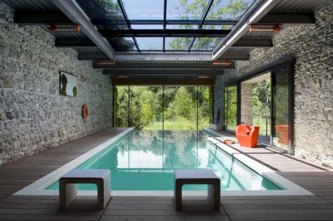 Pool with view of trees and sky