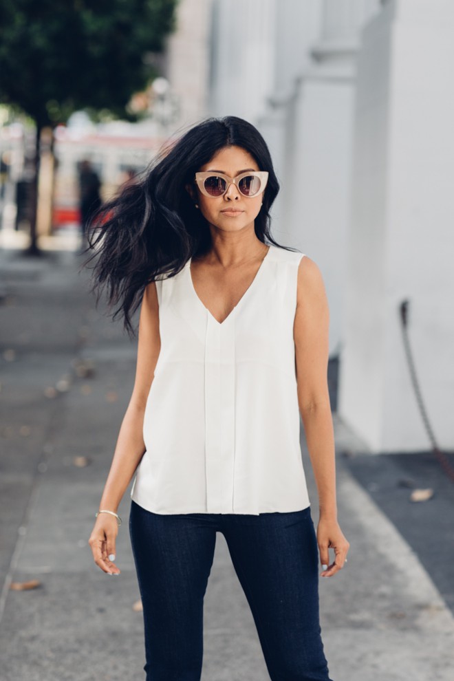 Wear a sleeveless, V-neck shirt