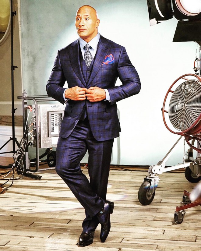 Although he started out with "kidneys" around his waist, Dwayne Johnson has a sophisticated style for dressing these days.