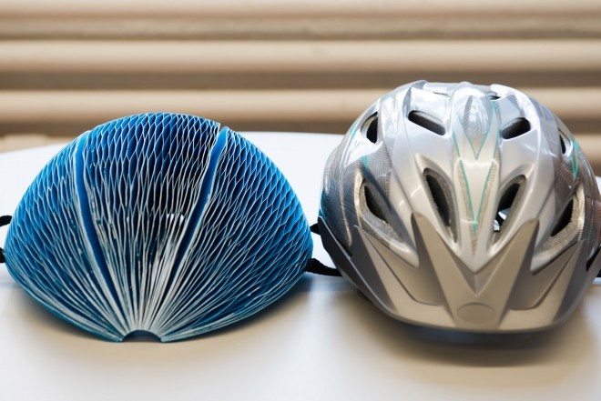 The EcoHelmet folding paper helmet is just as safe as a regular bicycle helmet.