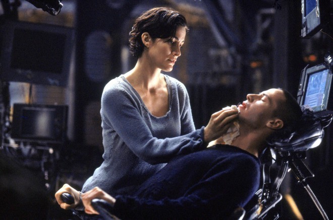 Carrie-Anne Moss and Keanu Reeves in The Matrix.