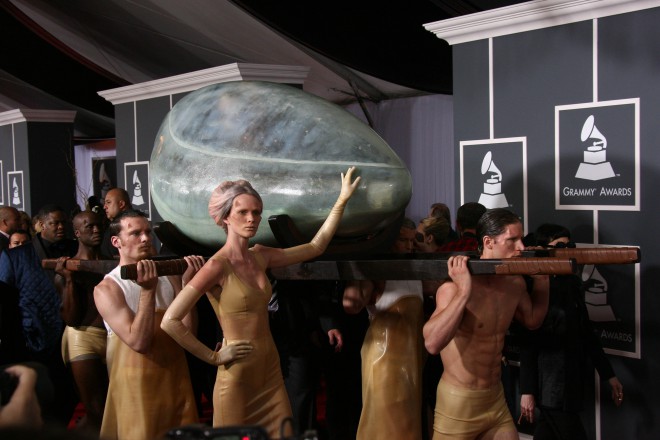 He arrives at the Grammys in a big egg. 